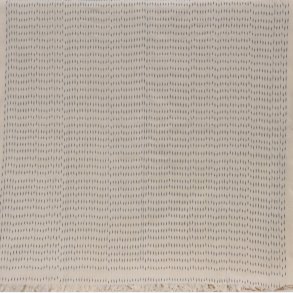 Ikat tekstil med prikker - gr og rhvid